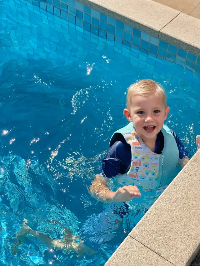 Kids swim vest in pool