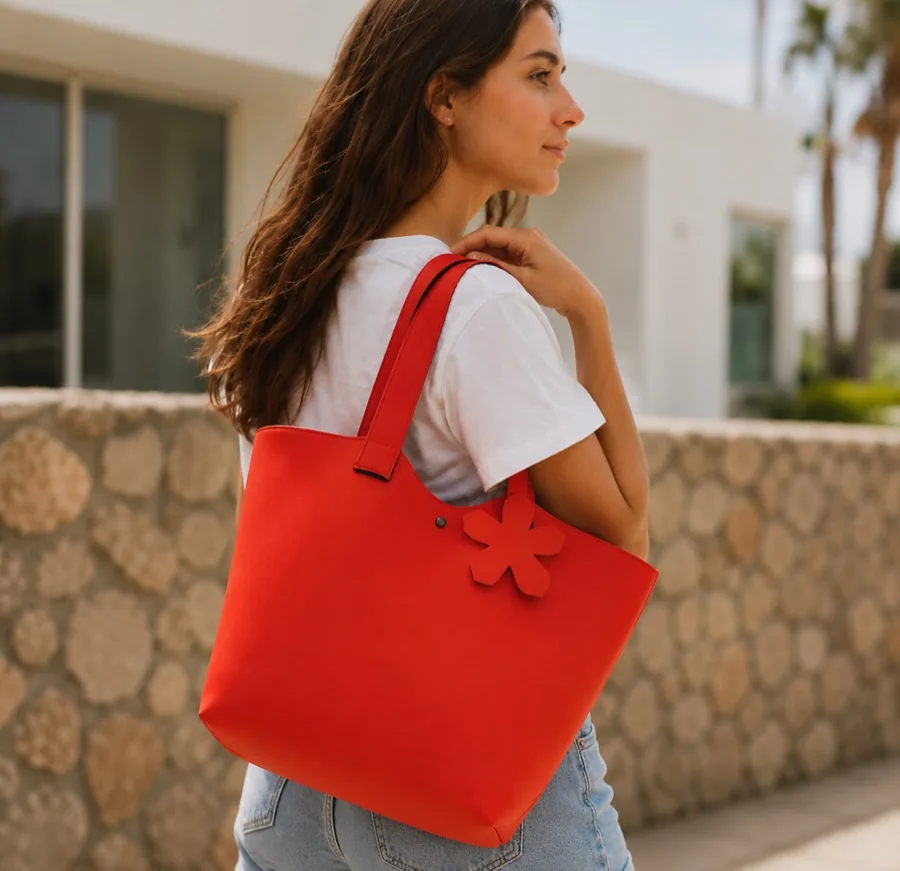 Red neoprene tote bag with shoulder straps
