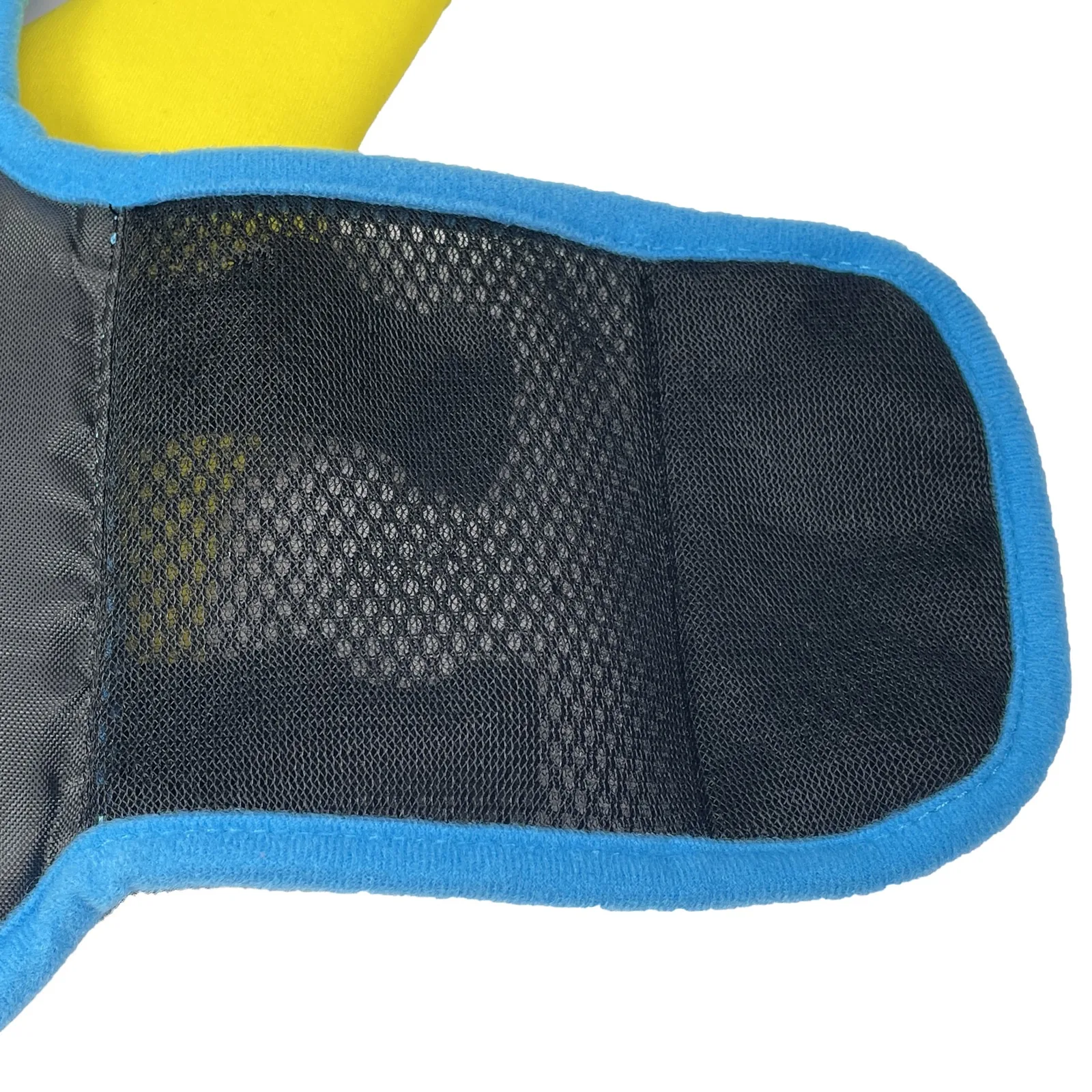 Breathable black mesh lining detail on dog life jacket